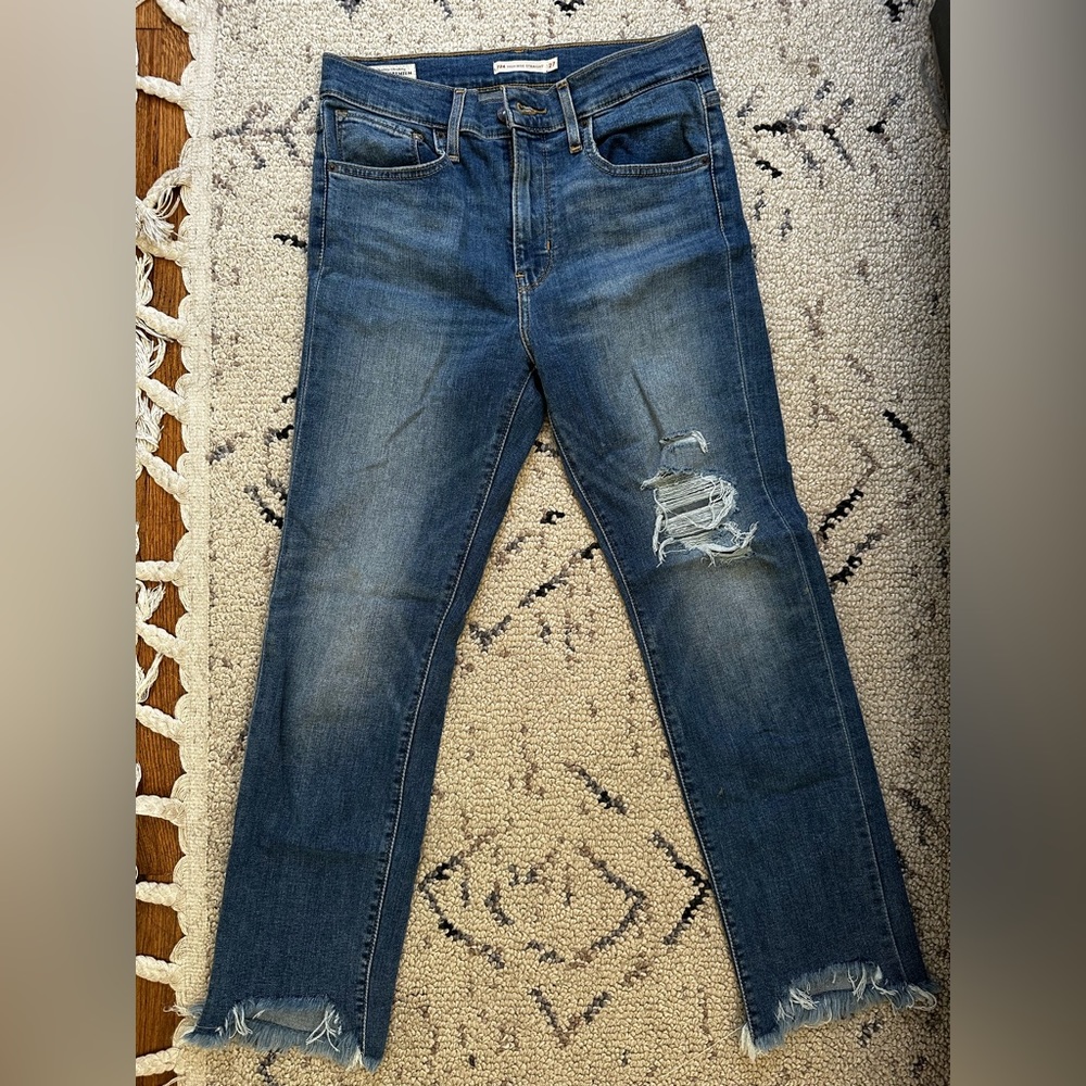 724 Levi high rise straight jean